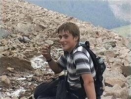 Luke takes a breather during the steep and rocky descent to the hostel
